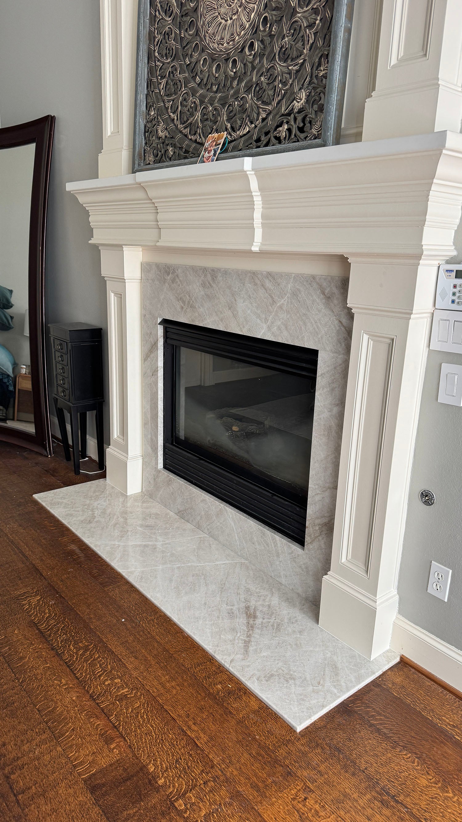 Taj Mahal Quartzite fireplace installation Project in Dallas, TX