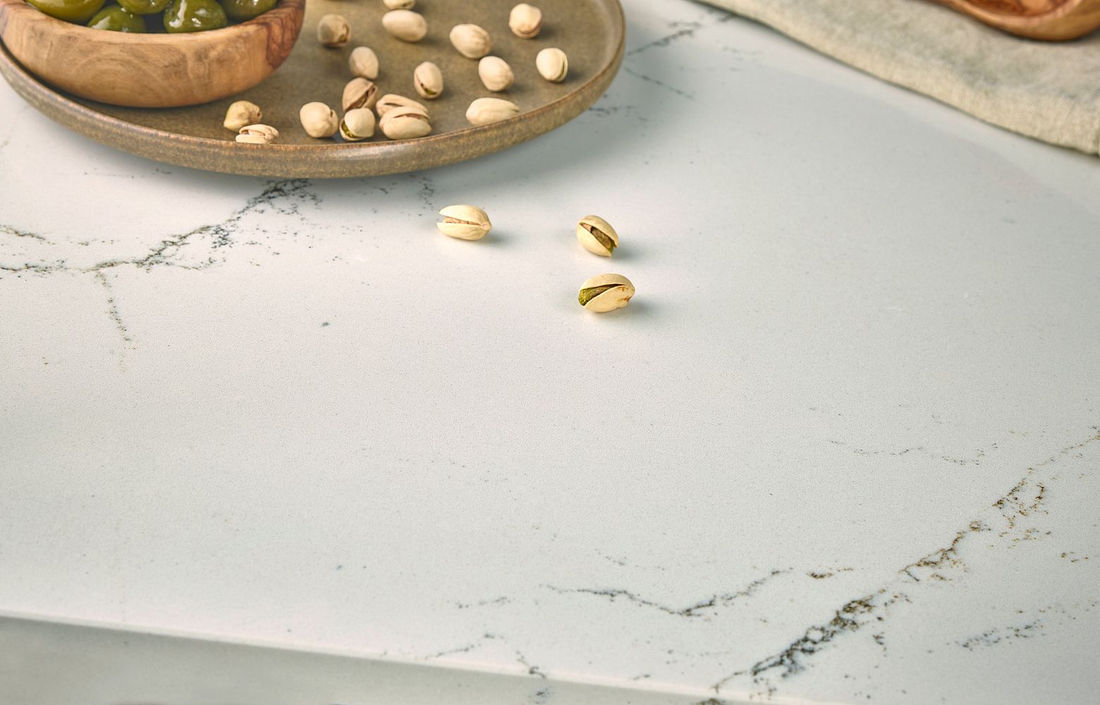 HAWKSMOORE Cambria Quartz detail olives pistachios