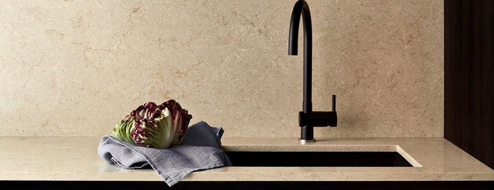 towel on the top of taj royale counters with undercount sink from caesarstone