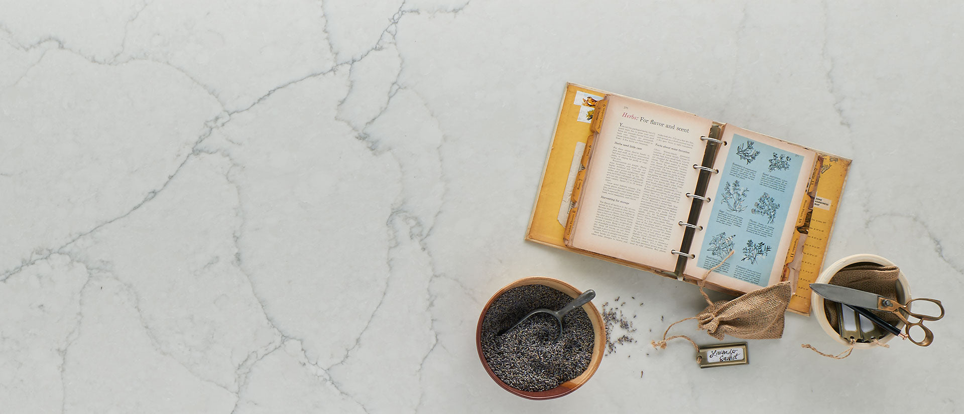 book on the table with calacatta monaco