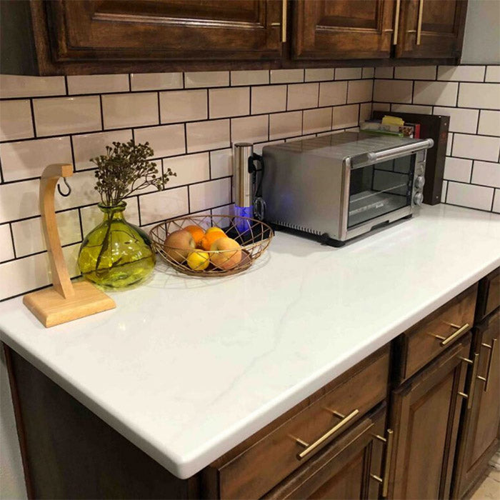 calacatta quartz with white subway tile