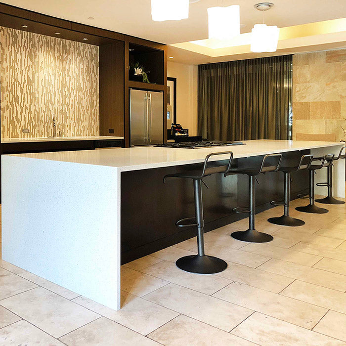 wahite sparkle quartz countertops with waterfall island