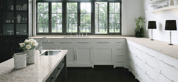white kitchen cabinets with moorland got countertops from caesarstone