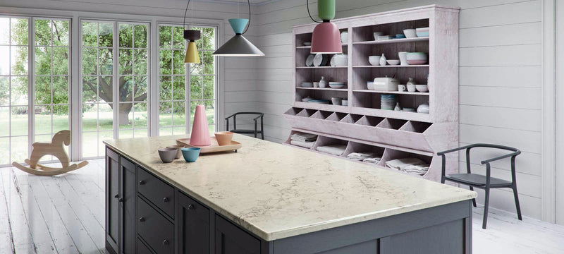 dark grey island cabinets with noble grey countertop from caesarstone