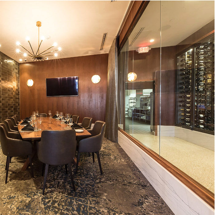 dining room with macabus white quartzite molding surround