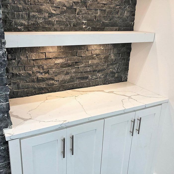calacatta sponda quartz with white cabinets at new construction