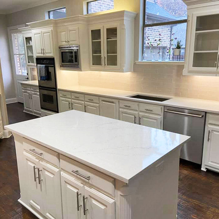 white cabinets with calacatta quartz countertops