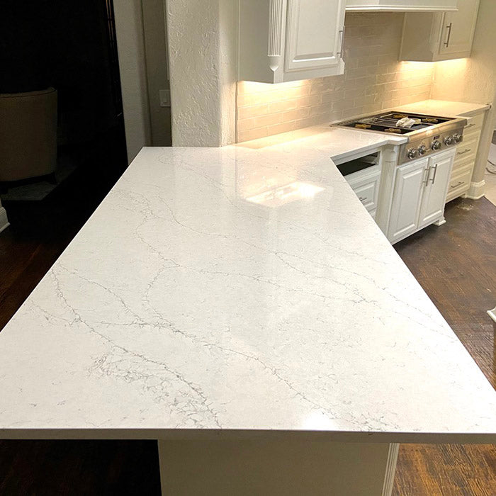 calacatta quartz countertop peninsula in the kitchen