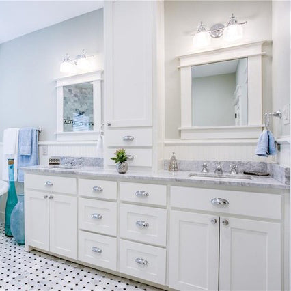 carrara marble bathroom countertops with white rectangular sinks and white cabinets