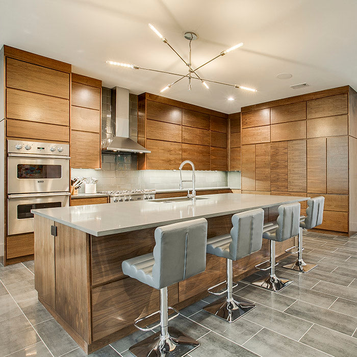 light brown cabinets with grey quartz countertops