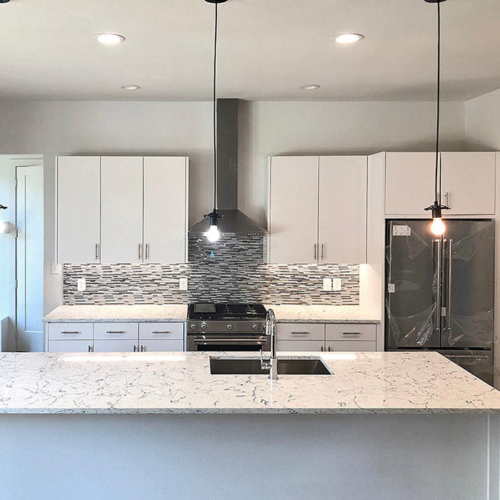 white kitchen cabinets with stainless steel appliances 